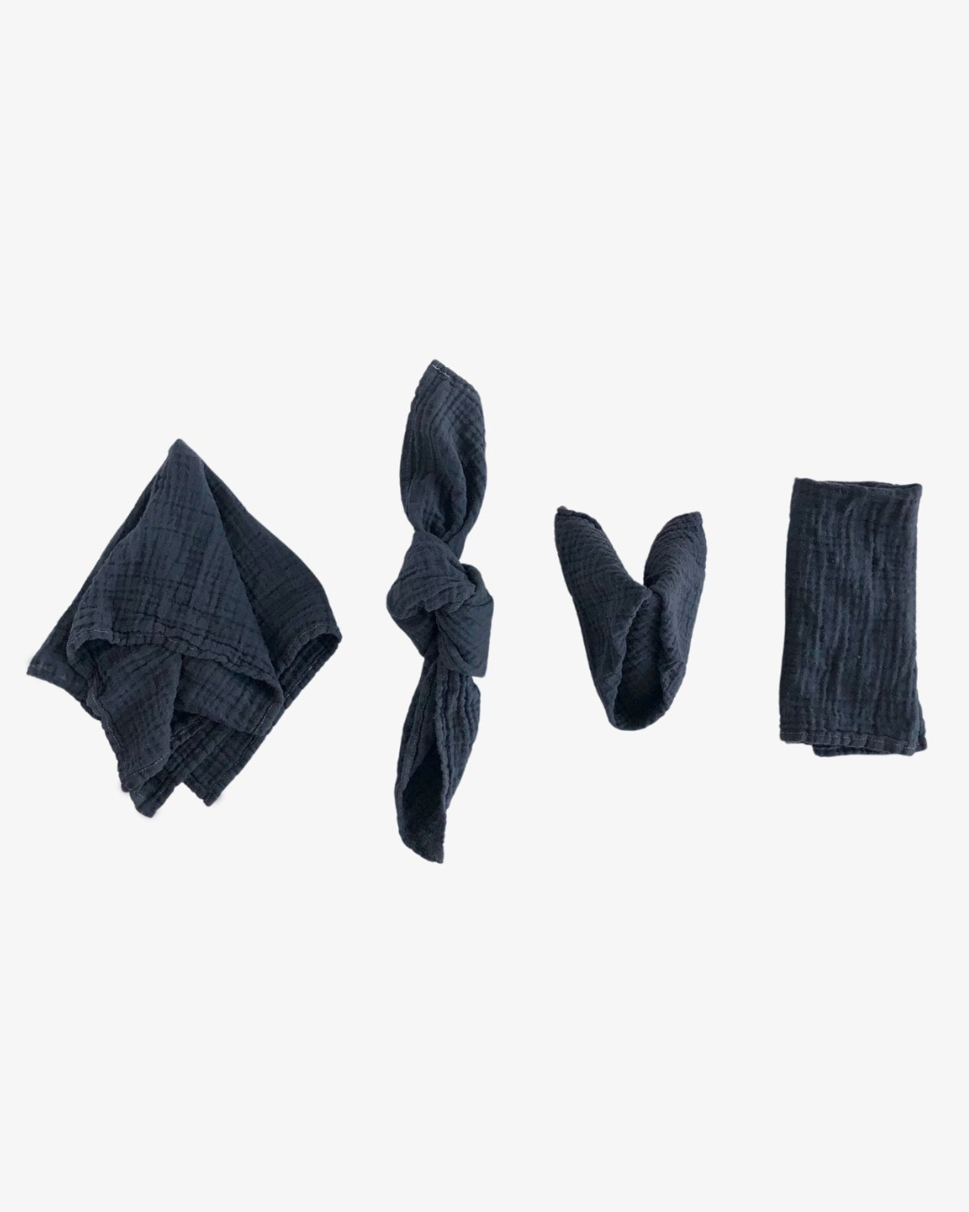 Charcoal organic cotton napkins in dusty black with crinkled texture, set of 4