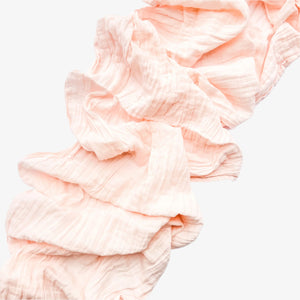 Blush organic cotton runner in light pink with crinkled texture, 108 inches long